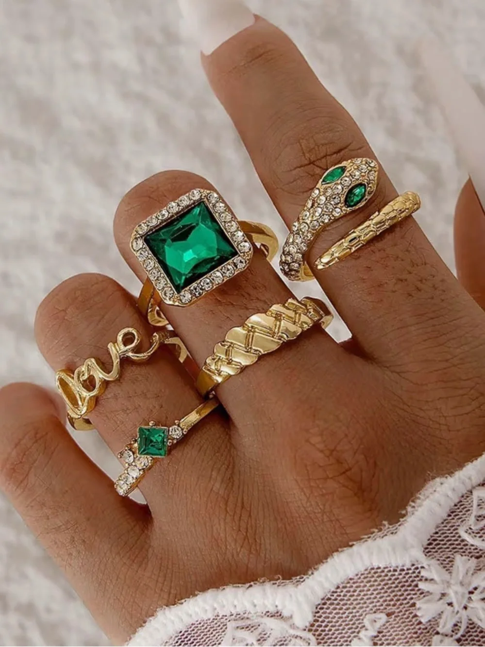 Gold Ring Set with Emerald Green Stones